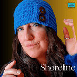 Side view of teal handknit beanie showing ribbed horizontal lines and chic seam-effect detailing