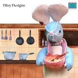 Alex – The Baking Mouse with batter in a bowl. A Blue Felt Miniature Baking Mouse Keepsake from Ditsy Designs - Parade Handmade