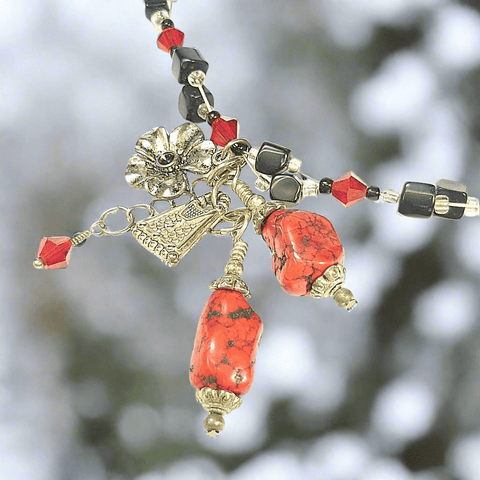 Red and black charm necklace with dyed hematite bead detail  Lapanda Designs - Parade Handmade