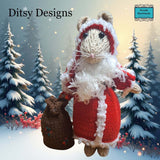 Santa Claus Mouse hand knitted in a  By Ditsy Designs seen here in snowy weather Parade-Handmade. Ireland