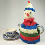 Colourful Clown Tea Cosy With Stripes With Cup By Shoreline - Parade Handmade