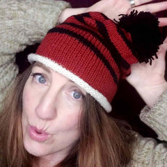 Hand Knitted Beanie in Rusty Red Black and Cream with Bobble - by Shoreline